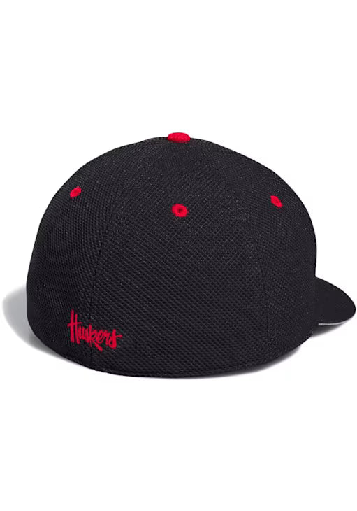 Nebraska Cornhuskers adidas black sideline flex hat featuring a red embroidered logo on the back.
