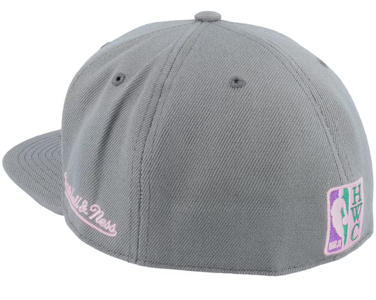 Gray and lavender Boston Celtics 20th Anniversary fitted hat featuring embroidered logo and side patch.