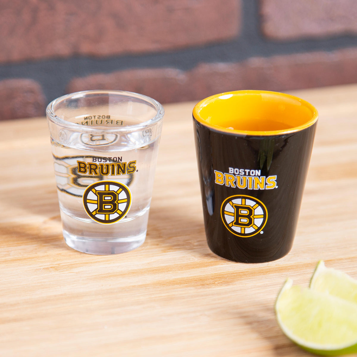 Boston Bruins 4-Piece Ceramic and Glass 2oz. Shot Glass Set