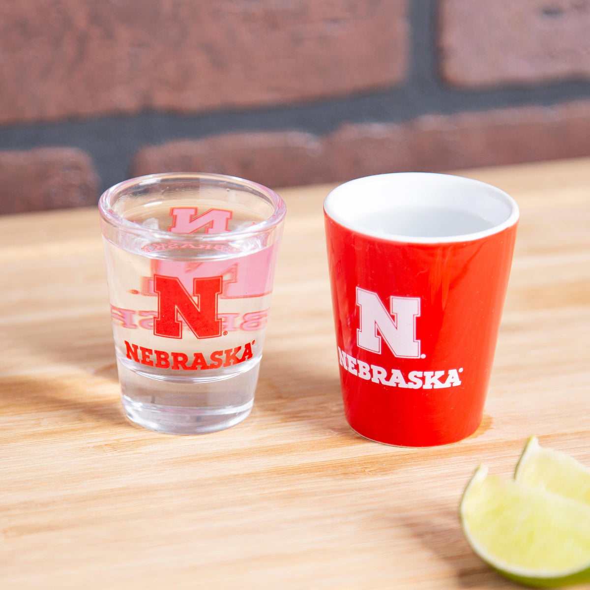 University of Nebraska 4-Piece Ceramic and Glass 2oz. Shot Glass Set