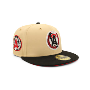 Los Angeles Angels 25th Anniversary Patch 59FIFTY fitted cap featuring a beige crown and black visor with embroidered logos.