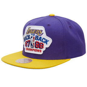 Los Angeles Lakers black core basic snapback hat featuring embroidered championship graphics and a two-tone design.
