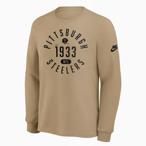 Nike Dri-Fit Pittsburgh Steelers beige long sleeve T-shirt featuring team graphics and established date. Ideal for fans.