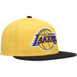 Los Angeles Lakers black Hardwood Classics Core snapback cap featuring a bold team logo and a contrasting yellow crown.