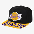 Los Angeles Lakers black and gold snapback cap featuring a bold wordmark and basketball graphic on the brim.
