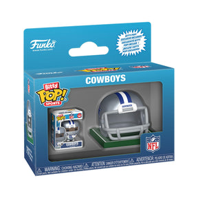 Front three-quarter view of a Dallas Cowboys Bitty Pop! helmet and player set in a blue retail box