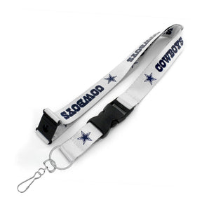 Angled view of Dallas Cowboys silver lanyard showcasing star logos, black buckle, and metal clip on white background