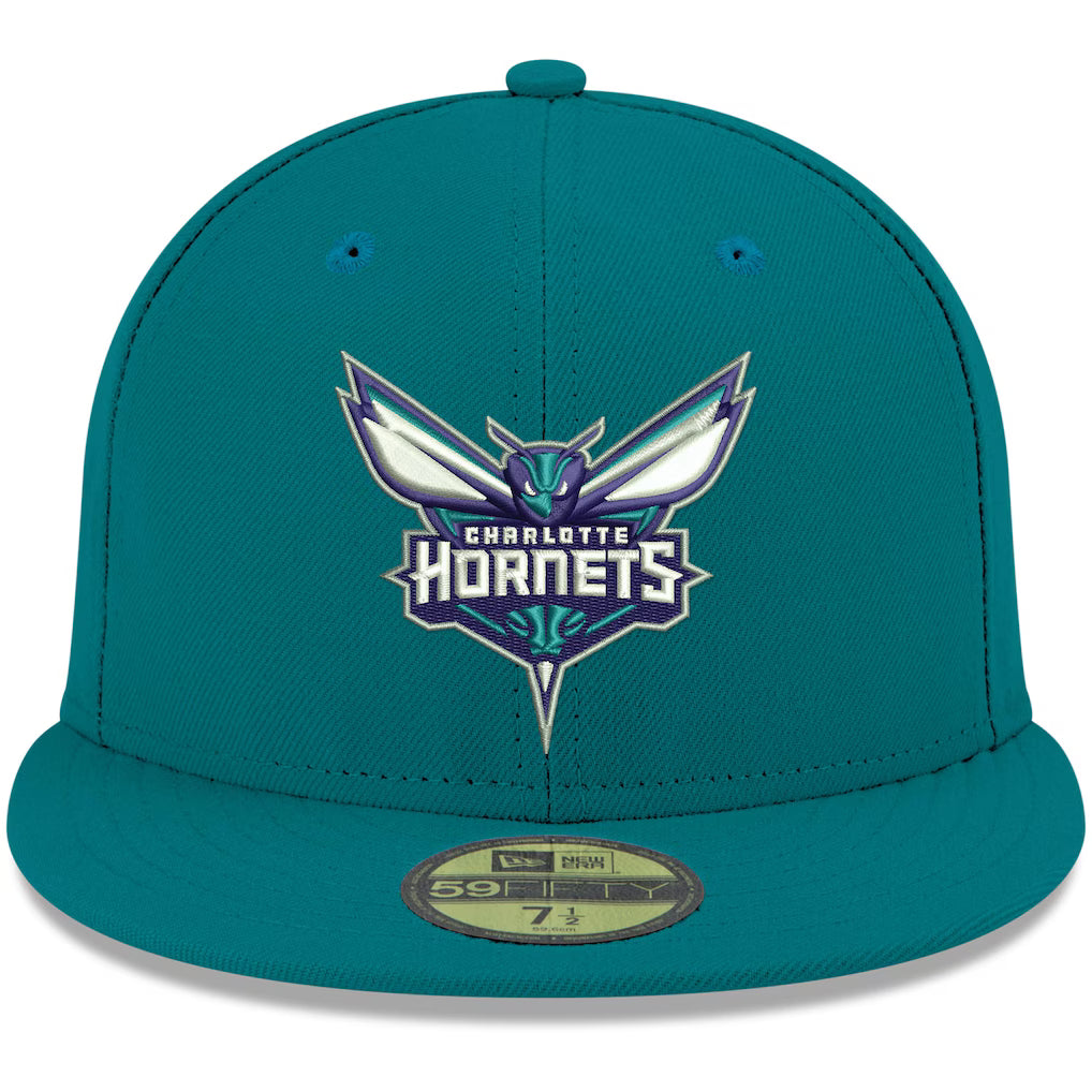 Teal Charlotte Hornets 59FIFTY fitted hat featuring the team logo on the front, perfect for fans and collectors.