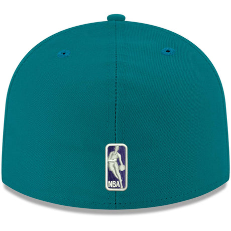Teal Charlotte Hornets 59FIFTY fitted hat featuring the NBA logo on the back, perfect for fans and collectors.