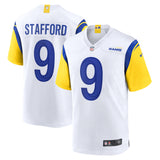 Los Angeles Rams Matthew Stafford white alternate Nike game jersey featuring blue numbers and yellow sleeves.
