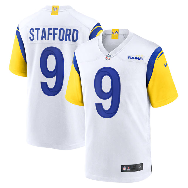 Los Angeles Rams Matthew Stafford white alternate Nike game jersey featuring blue numbers and yellow sleeves.