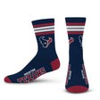 Front and back views of NFL Deuce crew socks showcasing Houston Texans logos and four red and white stripes on a white background