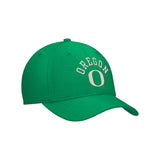 Three-quarter view of green Oregon Ducks Nike Campus Prep hat with chained, arched lettering and curved bill on white