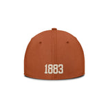 Back view of the Texas Longhorns Nike Campus Prep hat showcasing embroidered 1883 on a Texas orange cap against a white background