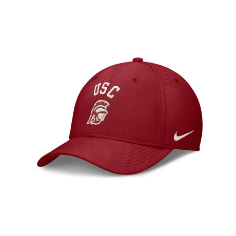 Front three-quarter view of red USC Trojans Nike flex hat showing white USC, Trojan, and Nike swoosh logos on white