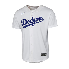 Front view of a youth white Shohei Ohtani Dodgers replica jersey with Nike swoosh and button front on white background